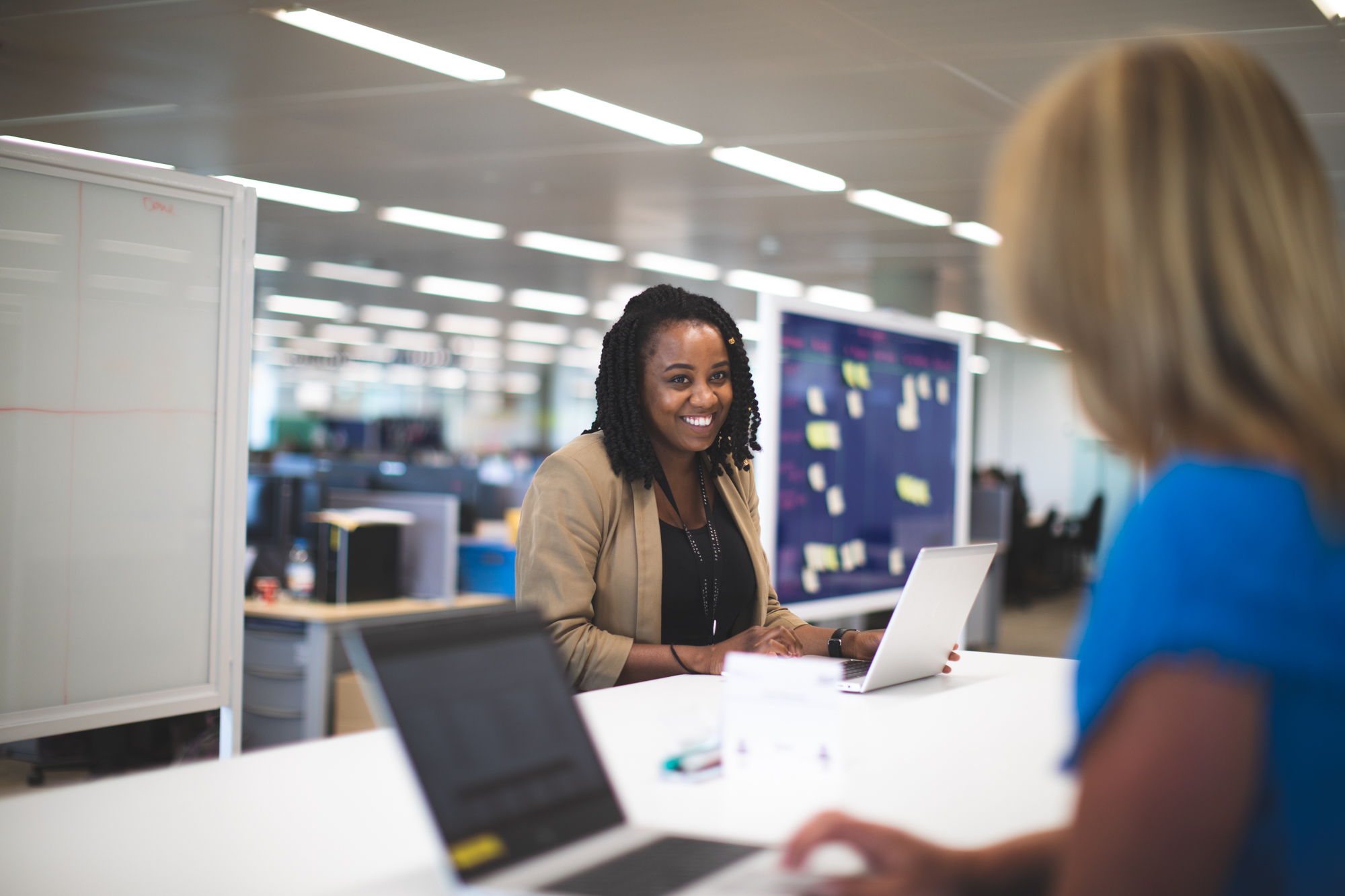 Image of a friendly women with laptop